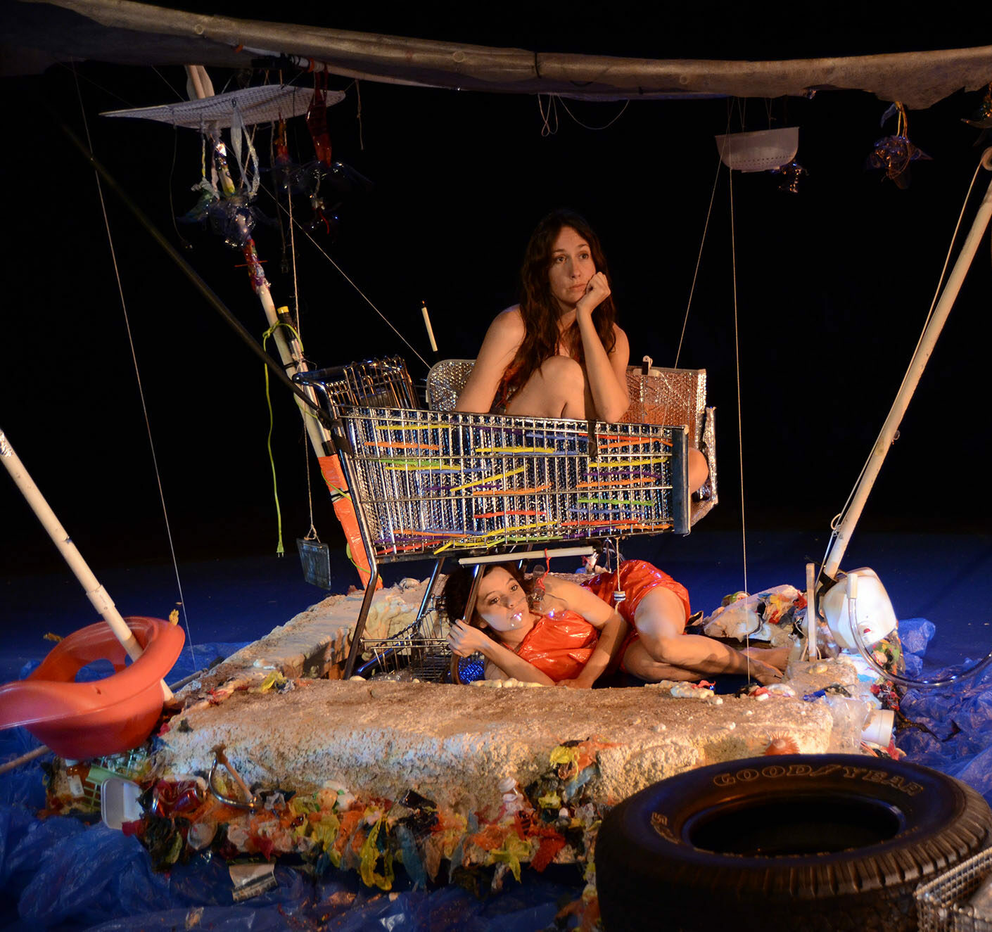 The Woman and the Child on the raft of trash
